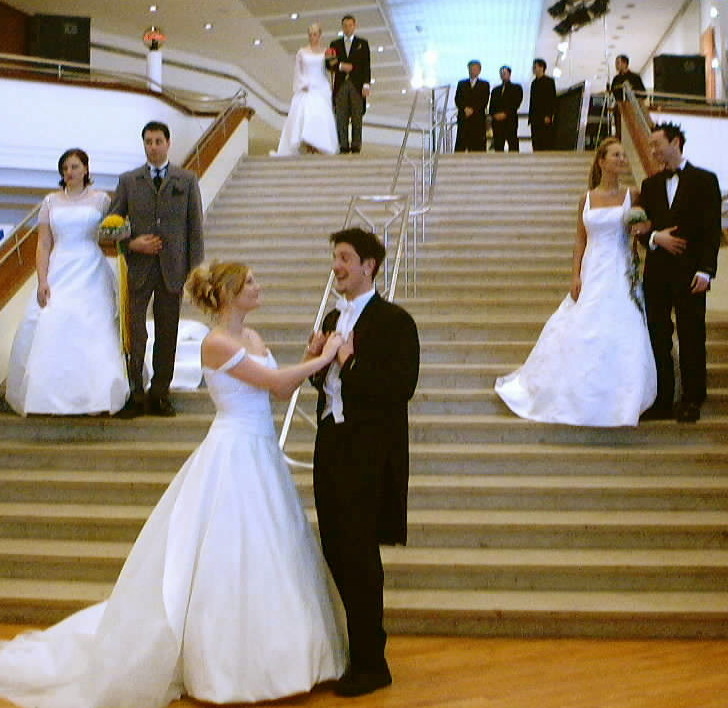 Paare auf der Treppe